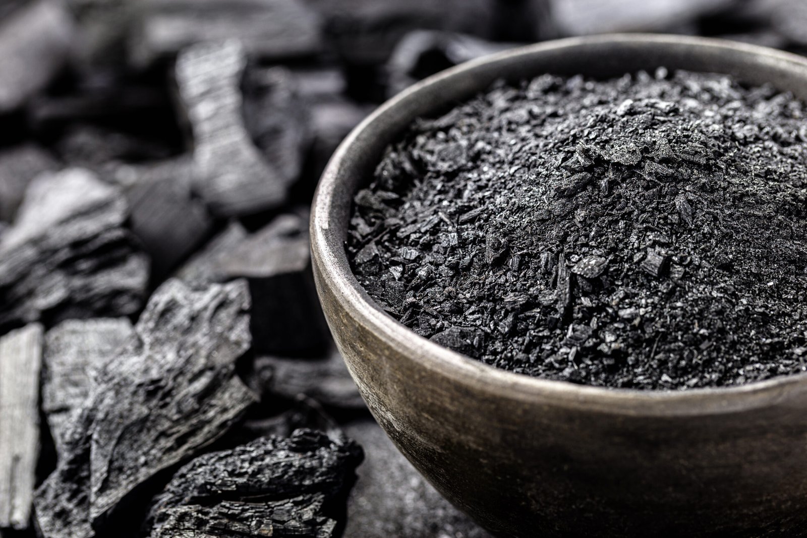 powdered charcoal, ground in a handmade clay bowl. With coal bottom to bottom, used in the beauty industry